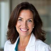 Portrait of Dr. Lisa Martinez, a friendly female doctor